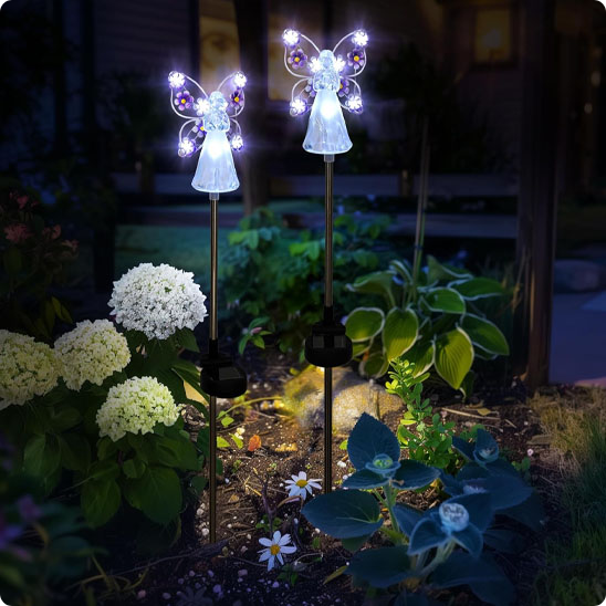 Luminaire solaire extérieur Angel dans un massif de plantes