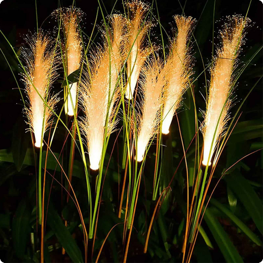Decoration Noel exterieur roseau doré éclairant des plantes