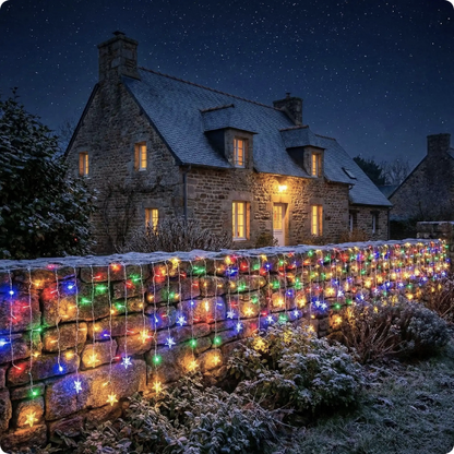 Guirlande extérieur pour Noël Flocon décorant un mur de clôture