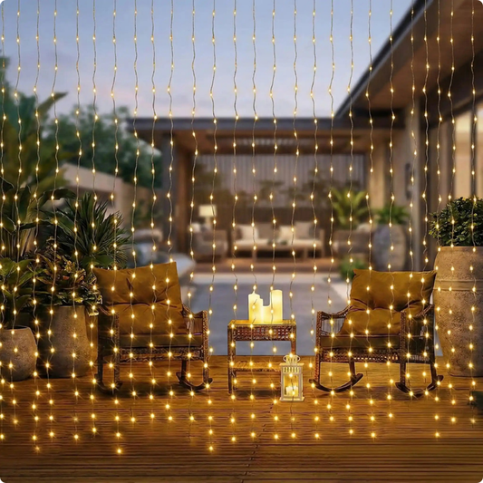 Guirlande lumineuse rideau Pluie étoilée décorant une pergola