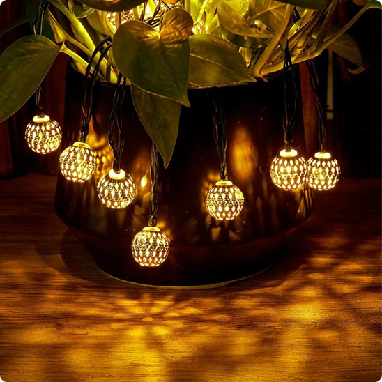 Guirlande solaire exterieur Atlas décorant un pot