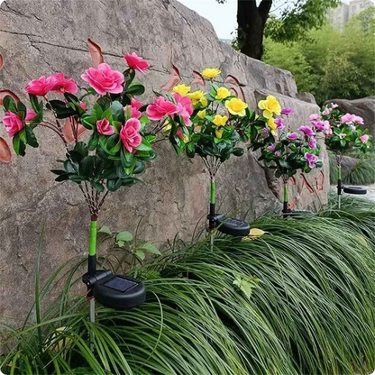 lampe solaire jardin Azalée disposée contre un mur