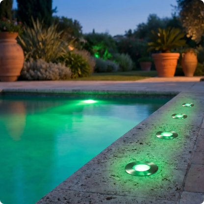 spot encastrable pour exterieur Sagittaire RVB argent vert encastré dans des margelles de piscine