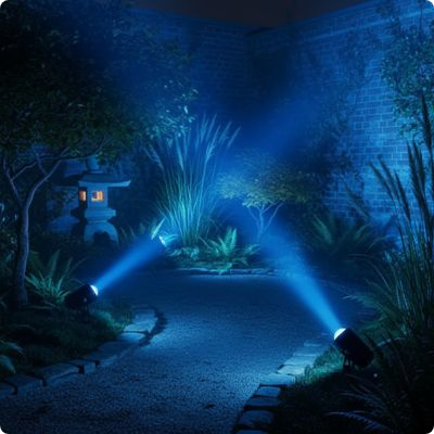 Spot exterieur vénus bleu éclairant un jardin