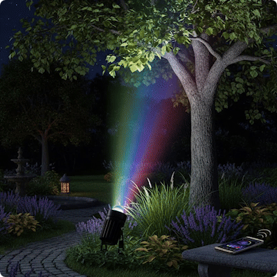 spot exterieur Vénus RVB bluetooth éclairant un arbre