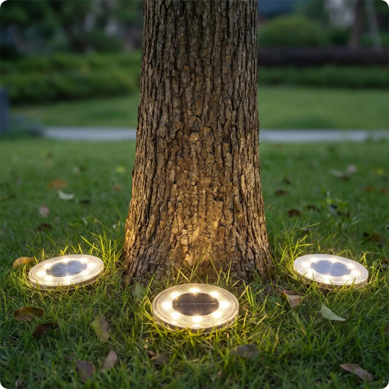 Spot solaire extérieur Splash éclairant un arbre